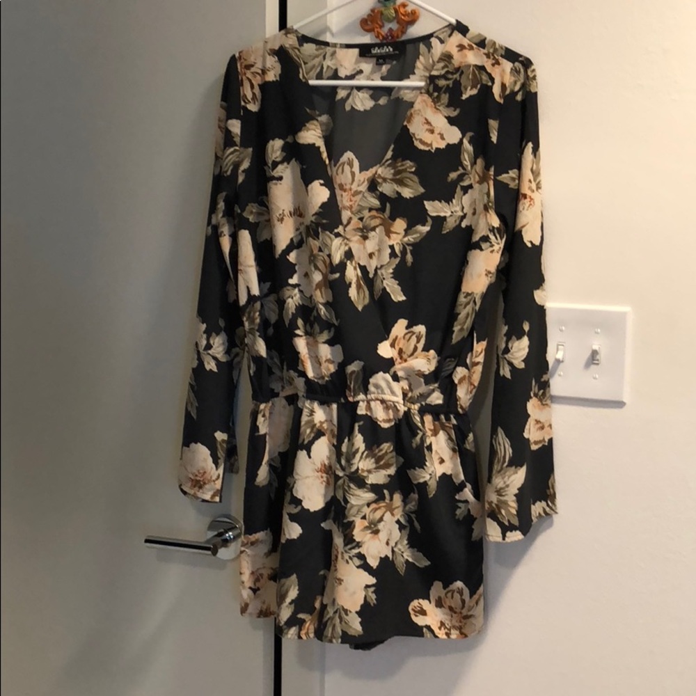 Floral jumpsuit with long bell sleeves